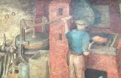 Jack Turlington, the blacksmith working at his forge in Church Street.jpg